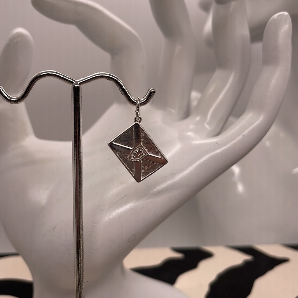 From Amos Pewter. Send a Letter Charm from Halifax